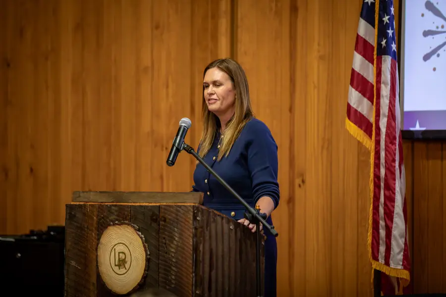 Governor Sarah Huckabee Sanders addresses a full room at the Legacy of Liberty dinner