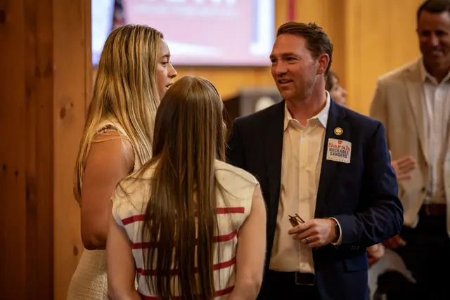 Members and guests in conversation during a Republican Party of Benton County event