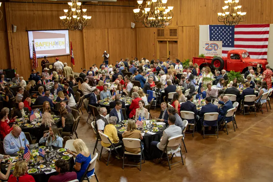 A full room of guests seated at round tables during a Republican Party of Benton County event