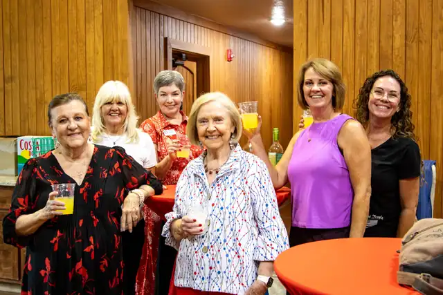 Volunteers gathered together before doors opened at the Legacy of Liberty dinner